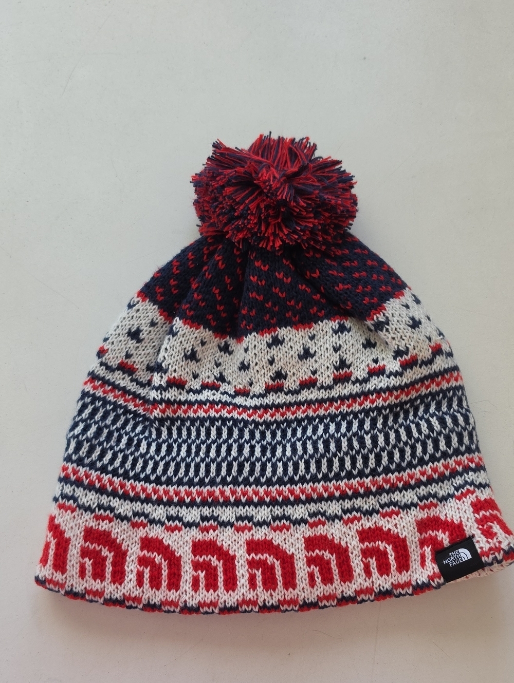 The North Face Red, Navy & White Pom Beanie Hat